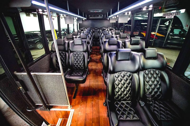 28 PAX Mid-Size Bus - Motor Coach
